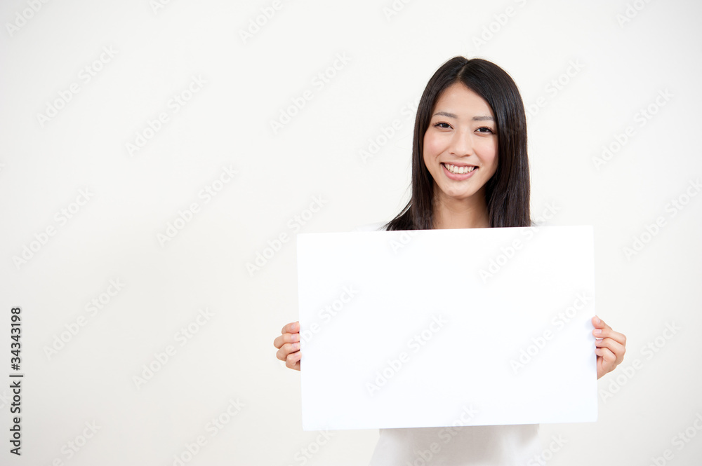 beautiful asian woman holding a blank whiteboad beautiful asian woman holding a blank whiteboad