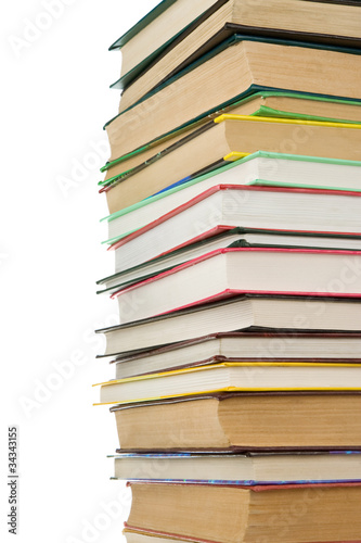 pile of new books isolated on white