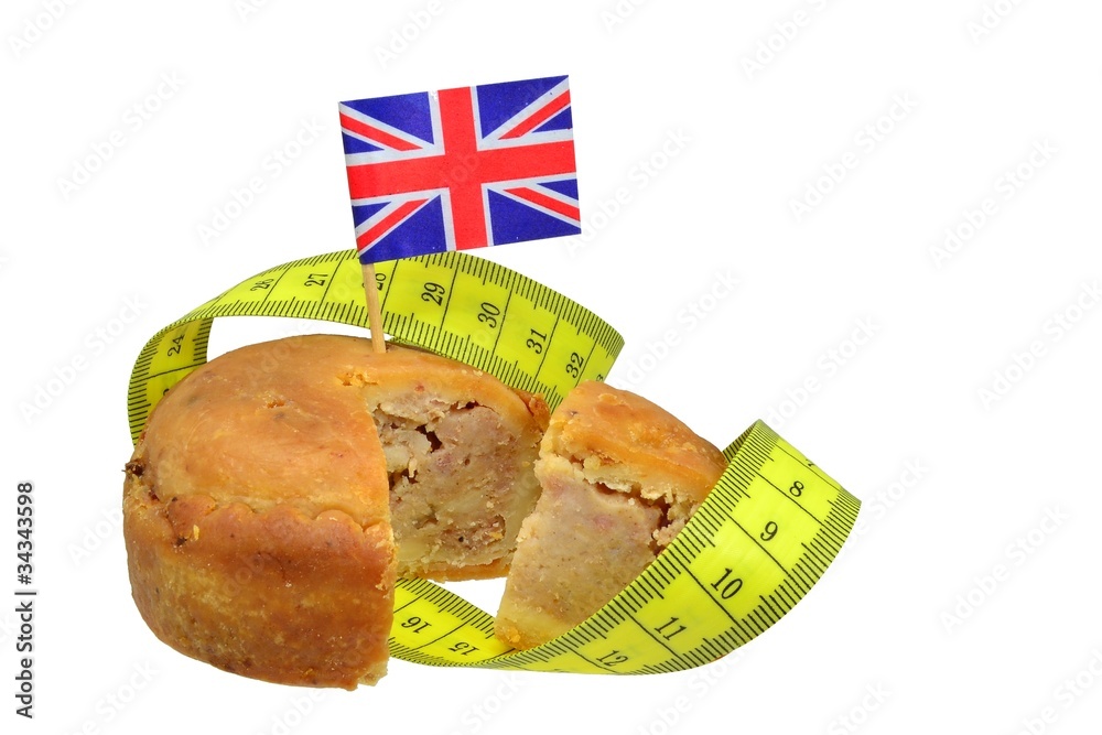 Fotografie British pork pie with flag & measuring tape. Diet concept