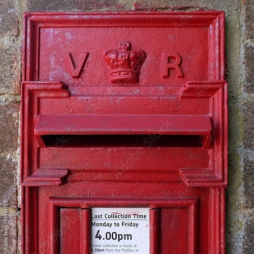 Victorian wall-mounted postbox, close-up of aperture.