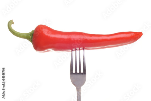 Red pepper on a fork © miles5