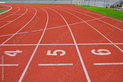 Numbered Running Track At A Sport Stadium