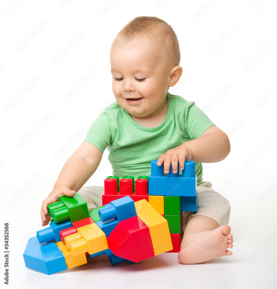Little boy with building bricks Little boy with building bricks