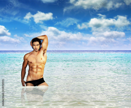 Sexy man in ocean © CURAphotography