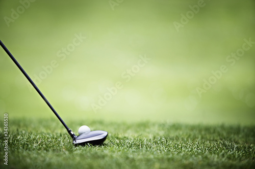 Golf background with driver and ball.