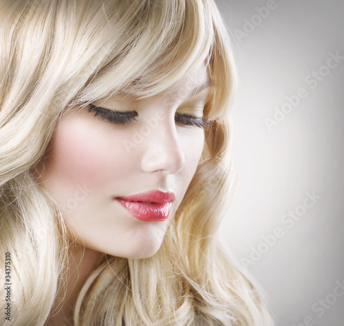 Blond Hair. Beautiful Woman Portrait. Hairstyle #34375310