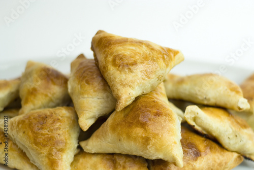 Midle Asian pies with meat, samsa on white background
