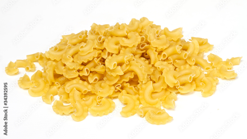 close up of a dried italian pasta on white background close up of a dried italian pasta on white background