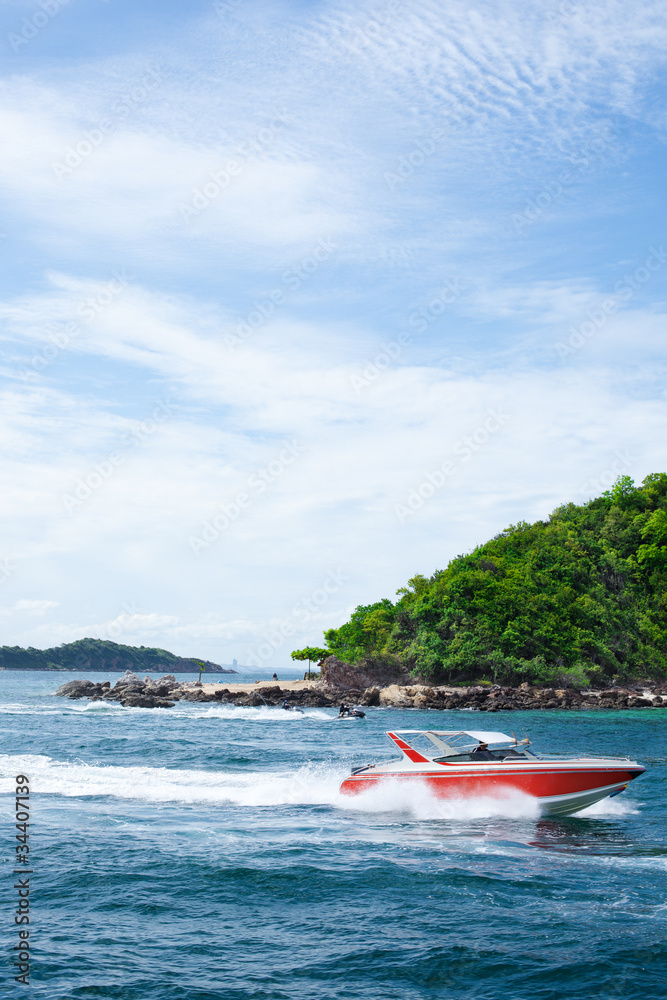 Fototapeta premium The boat floats near to island