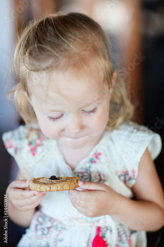 Girl eating cookie