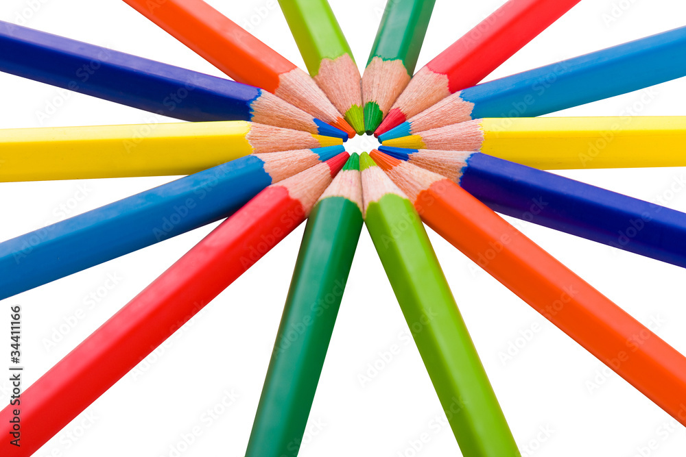 Color pencils in arrange in color wheel colors on white backgrou