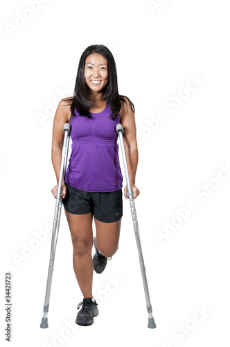 Vászonkép Asian Woman on Crutches