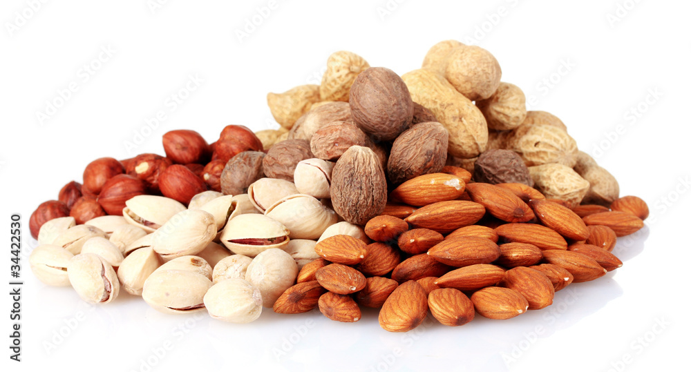 almonds, nutmeg, peanuts and pistachios isolated on white almonds, nutmeg, peanuts and pistachios isolated on white