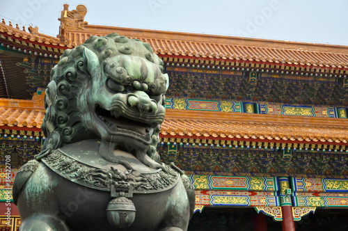bronze lion guarding the imperial palace in beijing