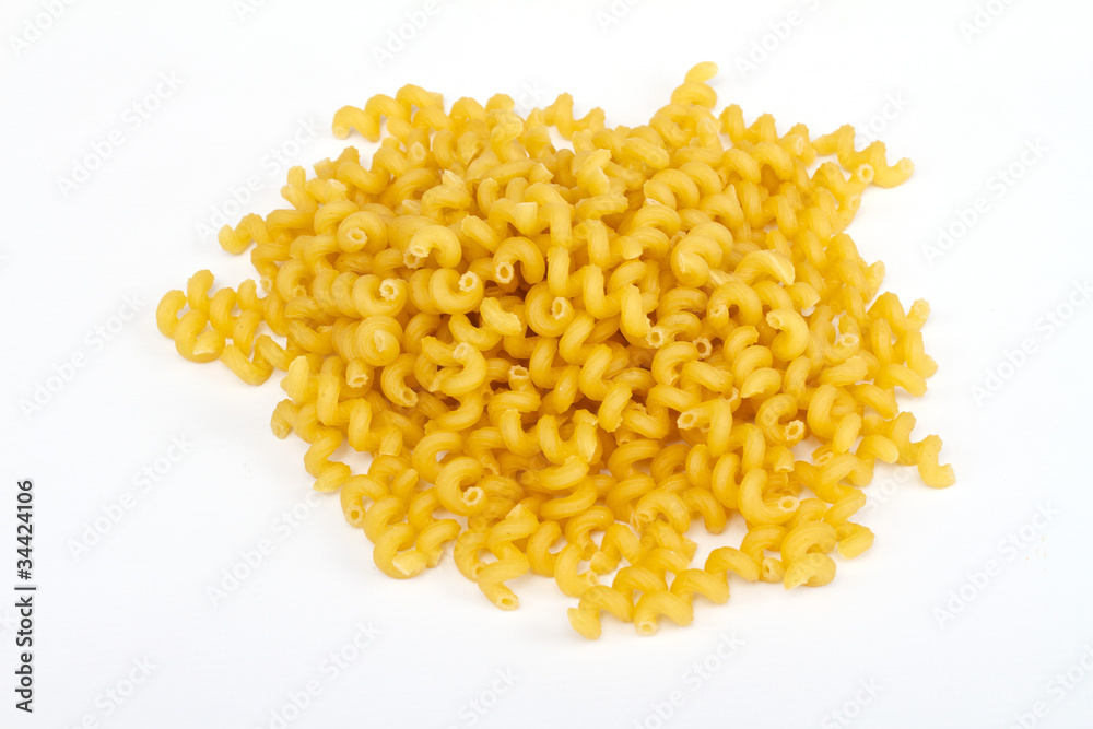 close up of a dried italian pasta on white background close up of a dried italian pasta on white background