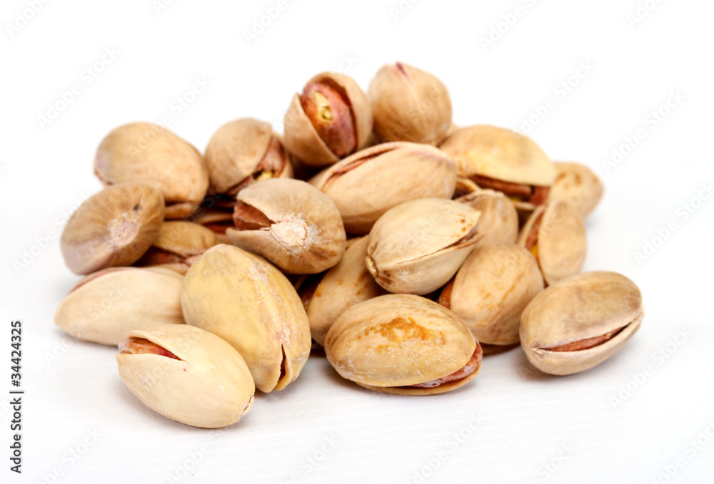 Close-up image of pistachios studio isolated on white background Close-up image of pistachios studio isolated on white background