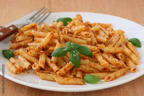 penne with sauce and basil