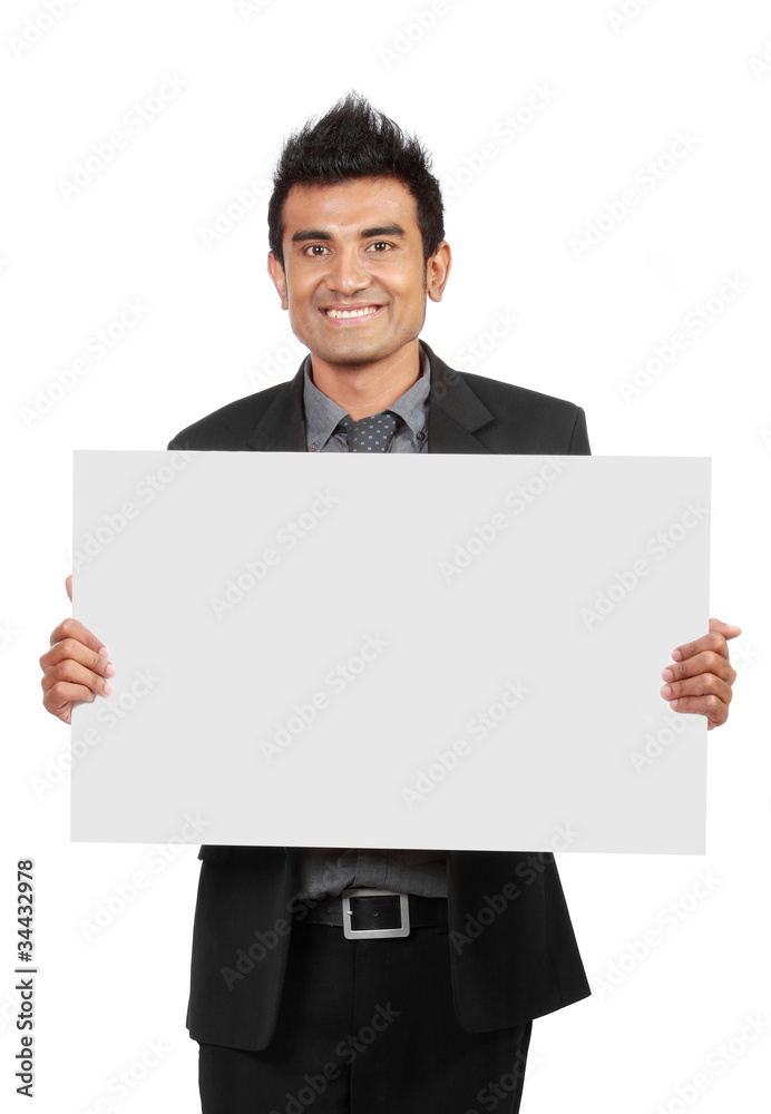 Handsome Businessman holding a blank board Handsome Businessman holding a blank board