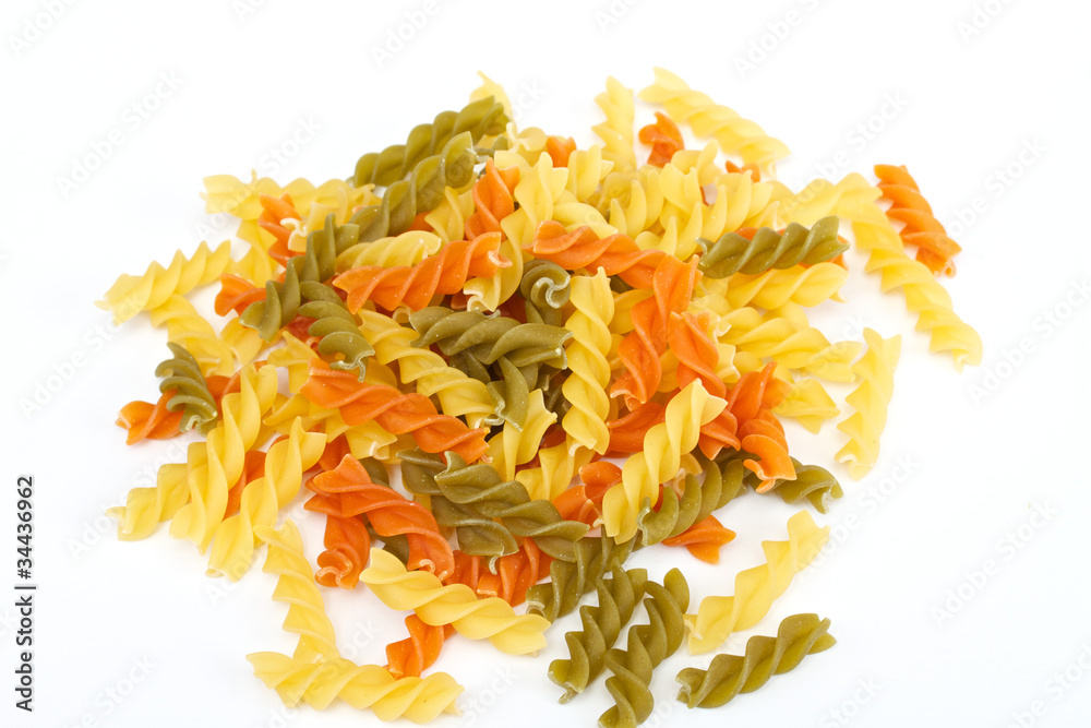 close up of a dried italian pasta on white background close up of a dried italian pasta on white background