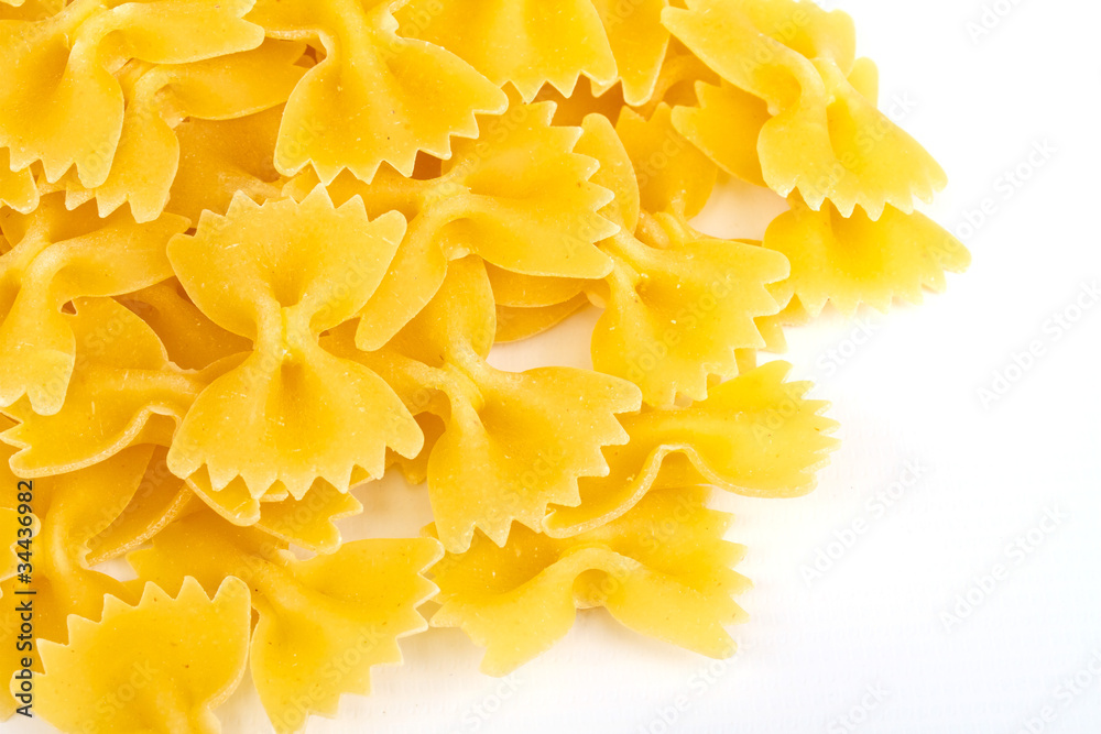 close up of a dried italian pasta on white background close up of a dried italian pasta on white background
