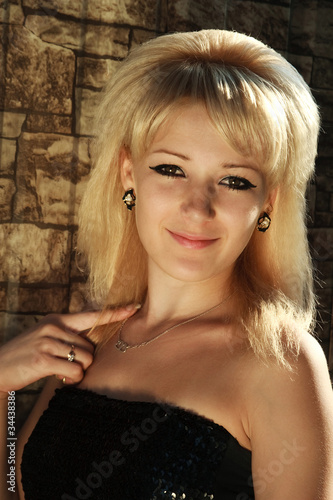 Free Download a portrait of the blond girl indicating a finger on itself - GFXLoad