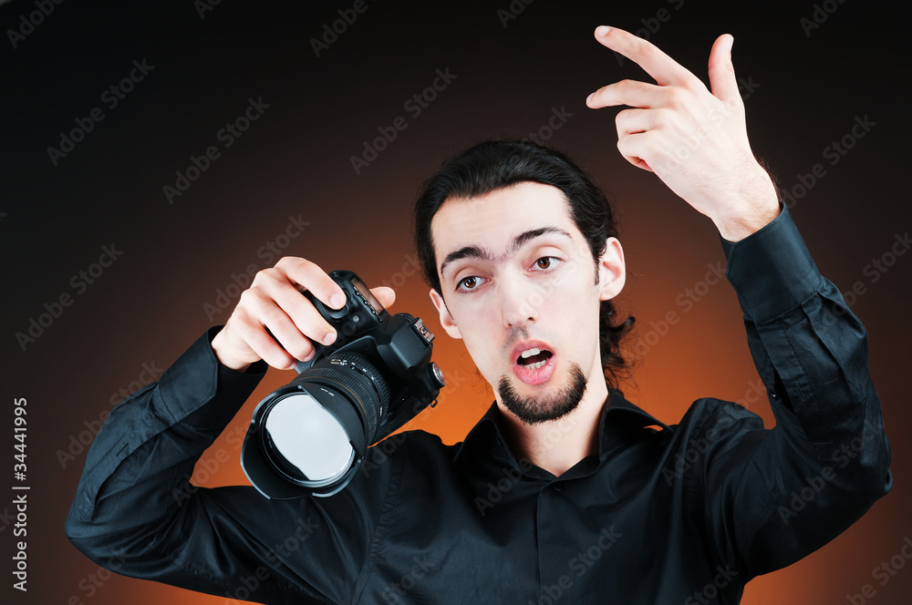 Photographer with the digital camera Photographer with the digital camera