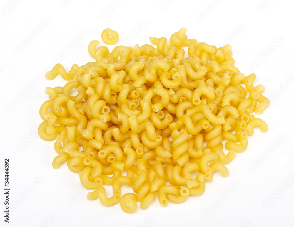 close up of a dried italian pasta on white background close up of a dried italian pasta on white background