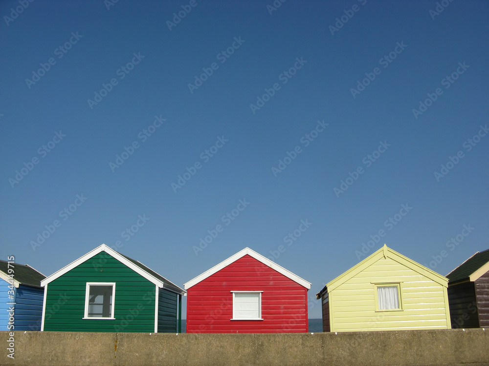 Bright beach huts in England