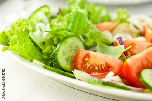 Vegetable salad with fresh basil