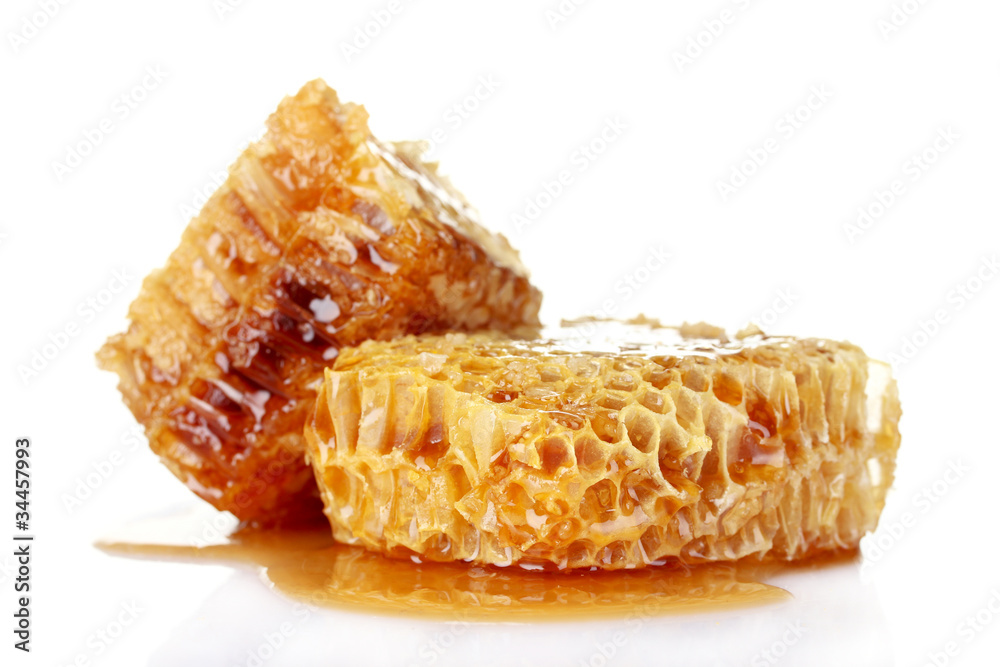 Combs with honey isolated on white Combs with honey isolated on white