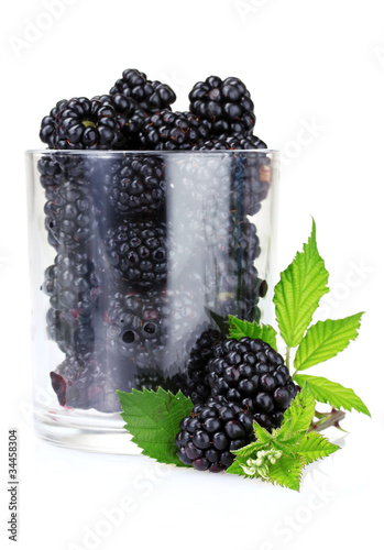 beautiful blackberries in glass isolated on white