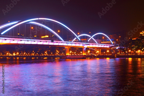 Guangzhou bridge at night in China © Jess Yu