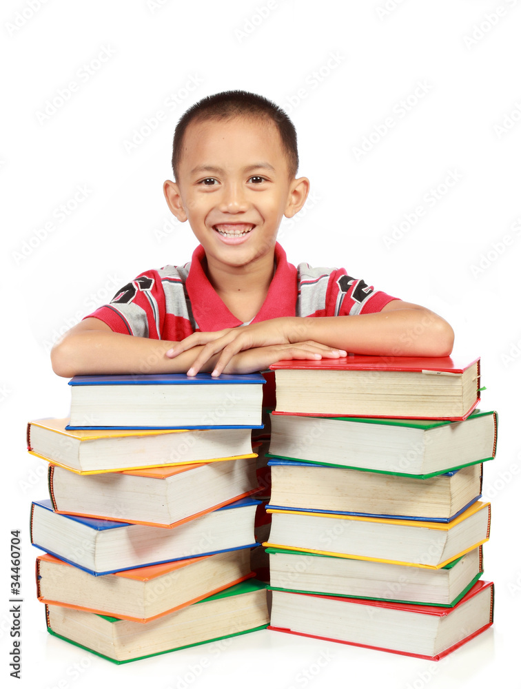 smiling little boy with his book isolated on white smiling little boy with his book isolated on white