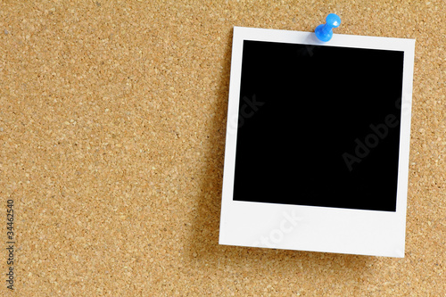 Polaroid an Kork Pinwand