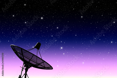 Fototapeta Naklejka Na Ścianę i Meble -  satellite disc against twilight sky