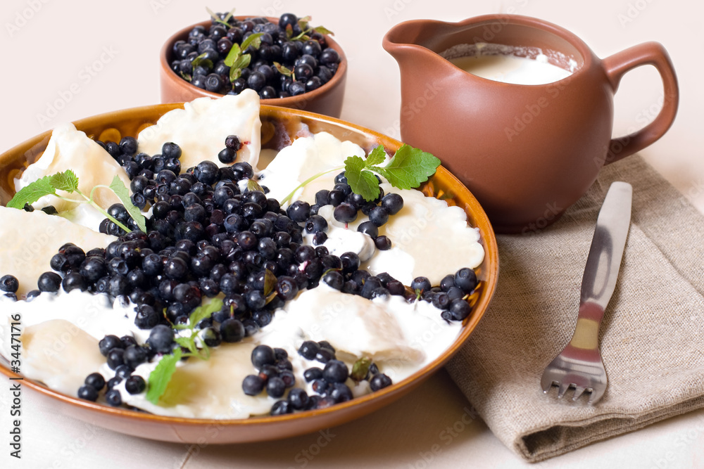Sweet and delicious dumplings with blackberries
