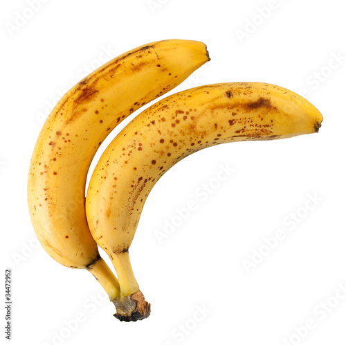 Old yellow bananas isolated on white background