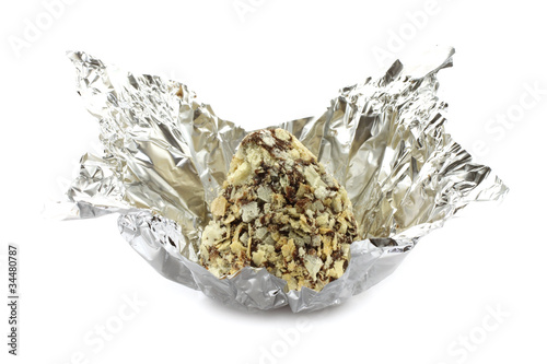 Chocolate truffle in candy wrapper