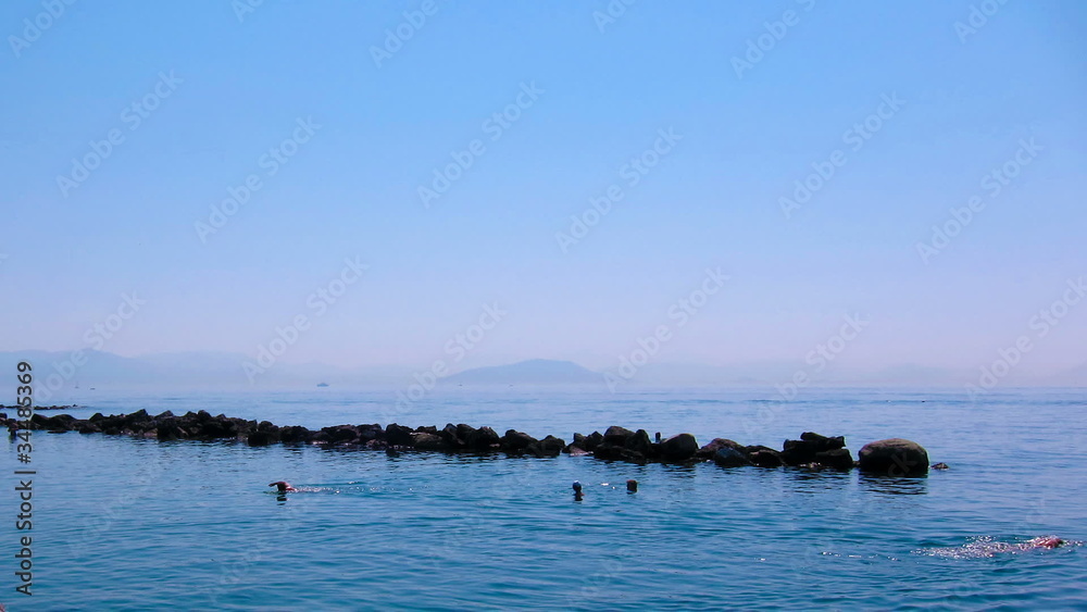 Time-lapse: tourists, swimming in Mediterranean sea, Corfu Time-lapse: tourists, swimming in Mediterranean sea, Corfu