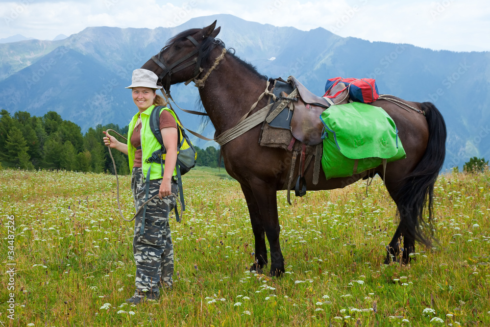 rider and horse with saddlebags
