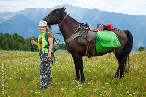 rider and horse with saddlebags