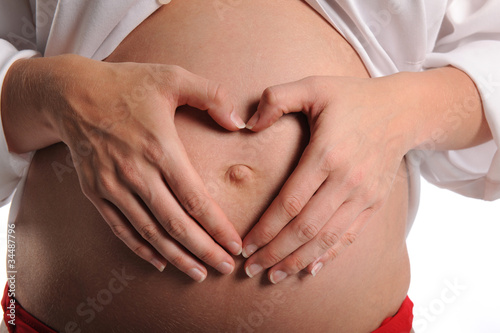 Wallpaper Mural Hands Making Heart Shape Over Stomach Torontodigital.ca