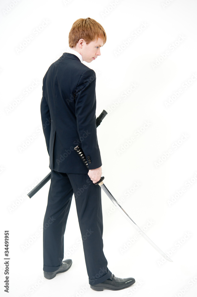 a businessman with samurai sword a businessman with samurai sword