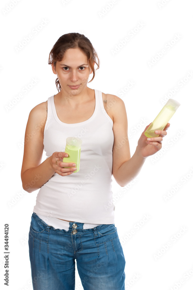 Woman with cosmetics isolated over white background Woman with cosmetics isolated over white background
