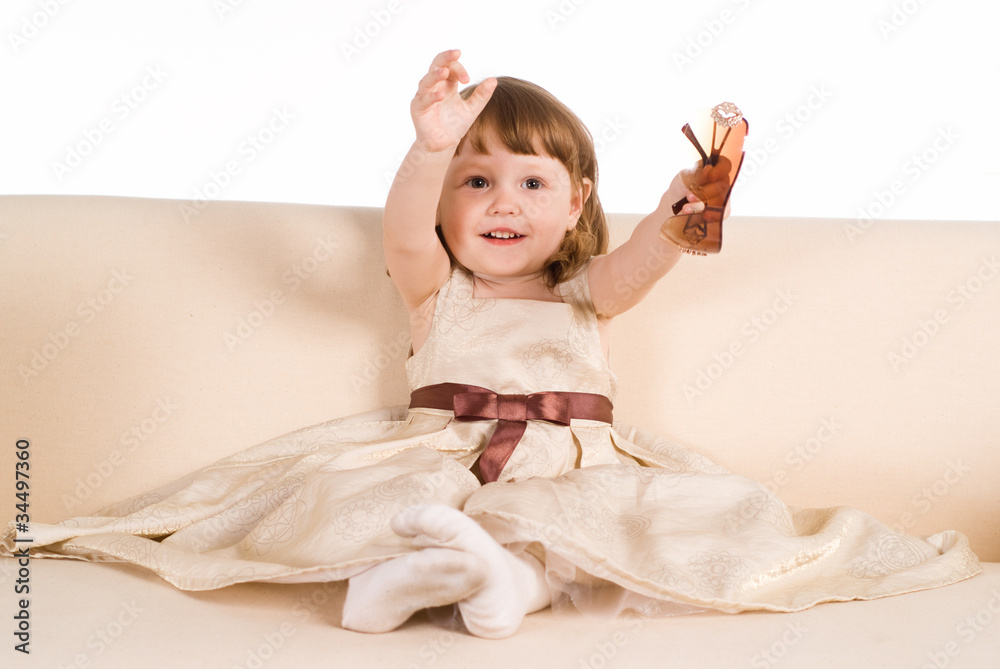 Fototapeta premium little girl on sofa
