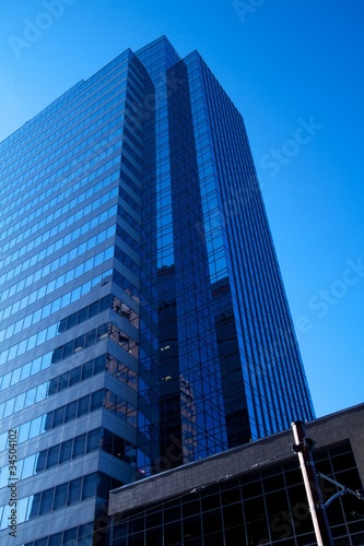 Glass Skyscraper & Blue Skies