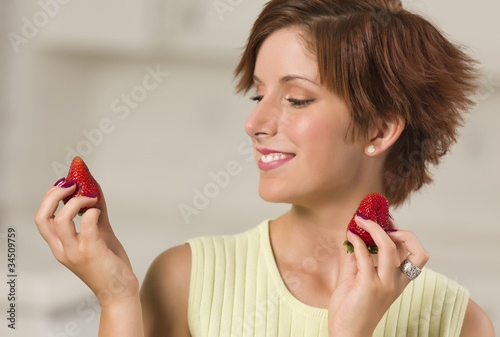 Pretty Red Haired Woman Hol...