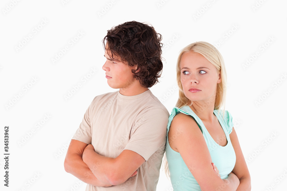 Sad couple standing back to back Sad couple standing back to back