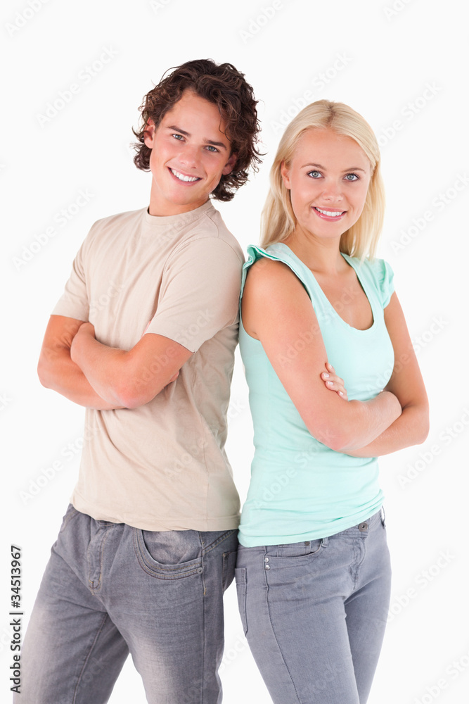 Portrait of a smiling couple looking into the camera Portrait of a smiling couple looking into the camera
