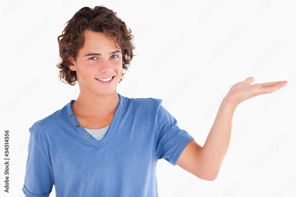 Close up of a cute guy showing copyspace Close up of a cute guy showing copyspace